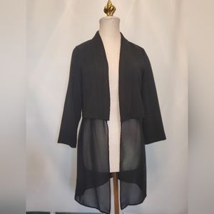 Blazer with sheer bottom.